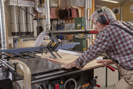 Ripping a board on the SawStop Industrial Cabinet Saw