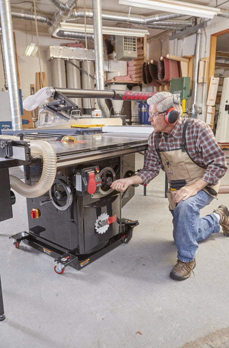 Blade tilt adjustment on the SawStop Industrial Cabinet Saw